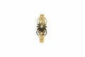 Lotus motif openable kada in gold finish held in hand