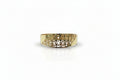 Daisy cut-out openable kada in polished gold finish held in hand