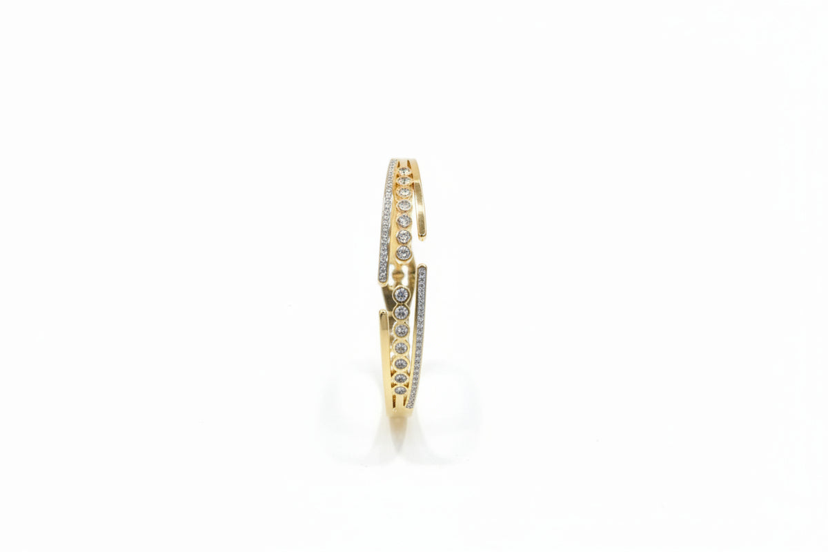 Solitaire line openable kada with pave zircon in gold finish held in hand