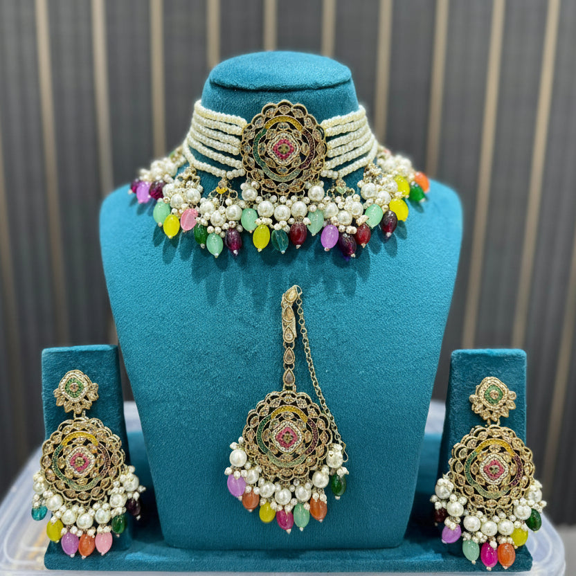 Gold-tone multicolour pearl choker necklace set with matching earrings and maang tikka
