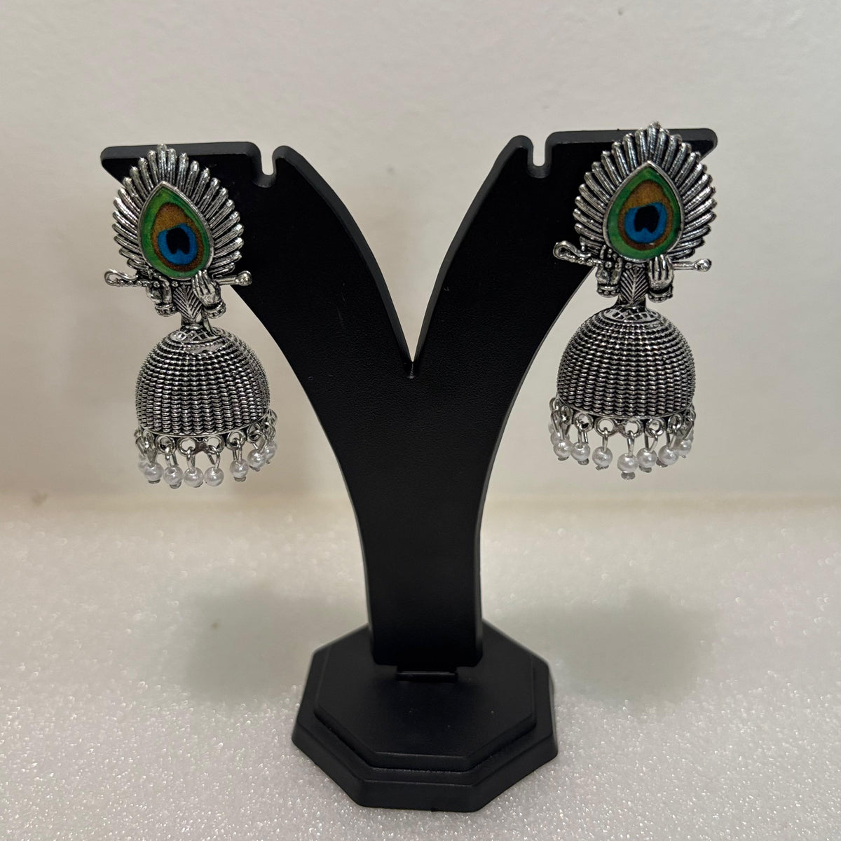 Premium oxidised peacock feather jhumka earrings with colourful stud, textured dome and bead fringe