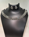 Oxidised necklace set with oval mirror-style stones, bead drops and matching stud earrings