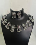 Oxidised floral stone tassel necklace with colourful centre stones and matching floral drop earrings