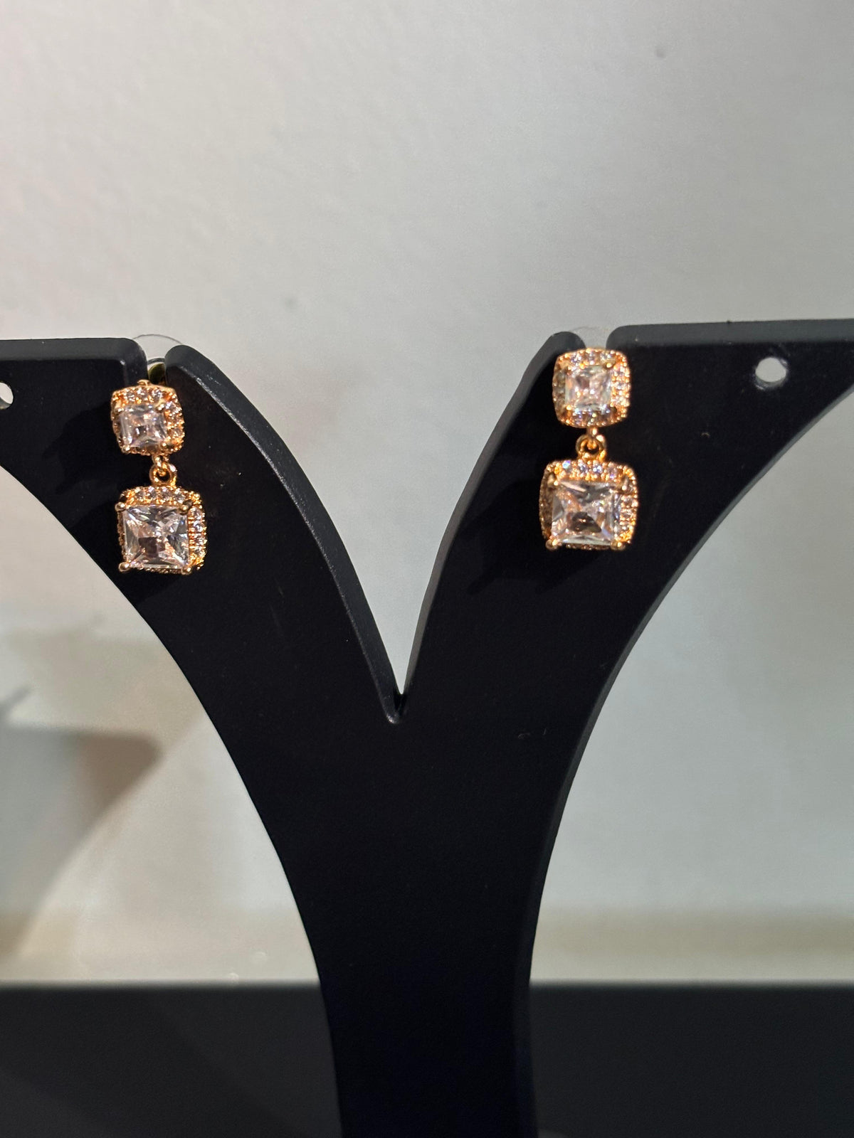 Premium anti-tarnish AD CZ double square drop earrings with sparkling stones in a gold-tone setting