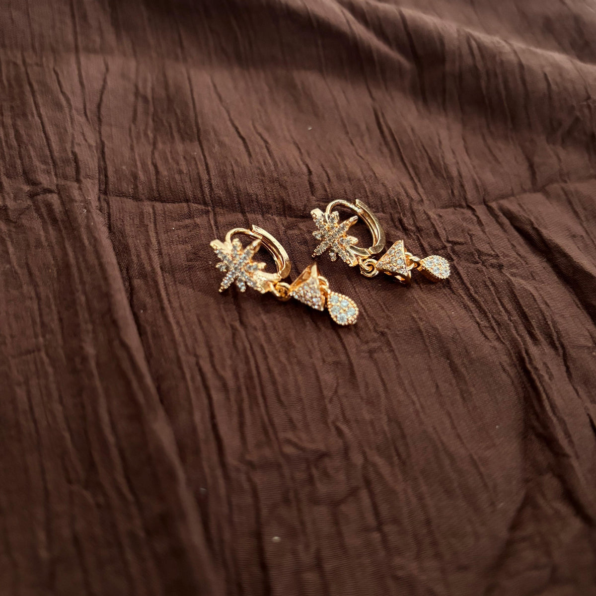 Gold-tone AD CZ floral drop earrings with sparkling stones and dangling drops