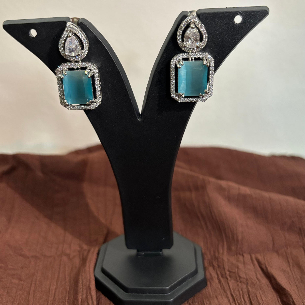 Premium AD CZ teardrop earrings with blue centre stones and crystal detailing