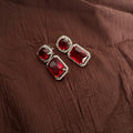 Premium AD CZ ruby-red geometric drop earrings with crystal detailing