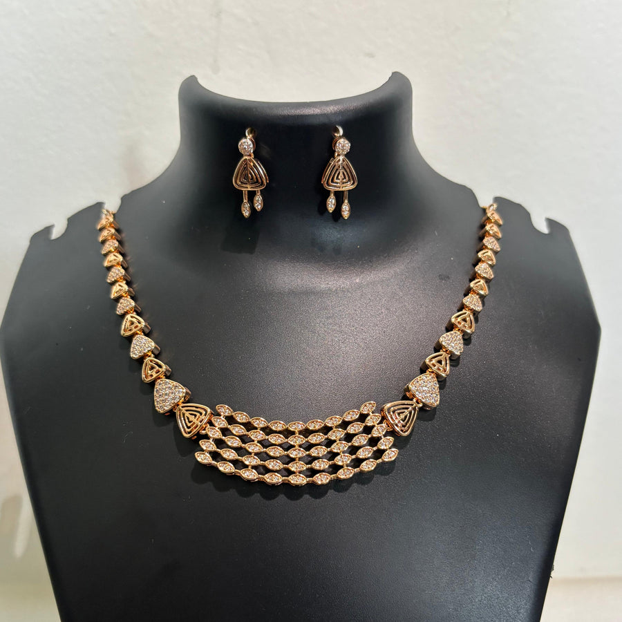 Gold-tone AD CZ multi-strand geometric necklace set with matching earrings