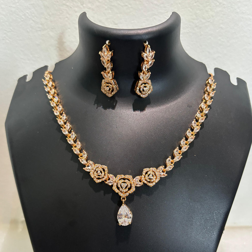 Gold-tone AD CZ floral heart pendant necklace set with matching drop earrings