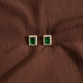 Gold-tone AD CZ emerald green rectangular stud earrings framed with sparkling clear stones