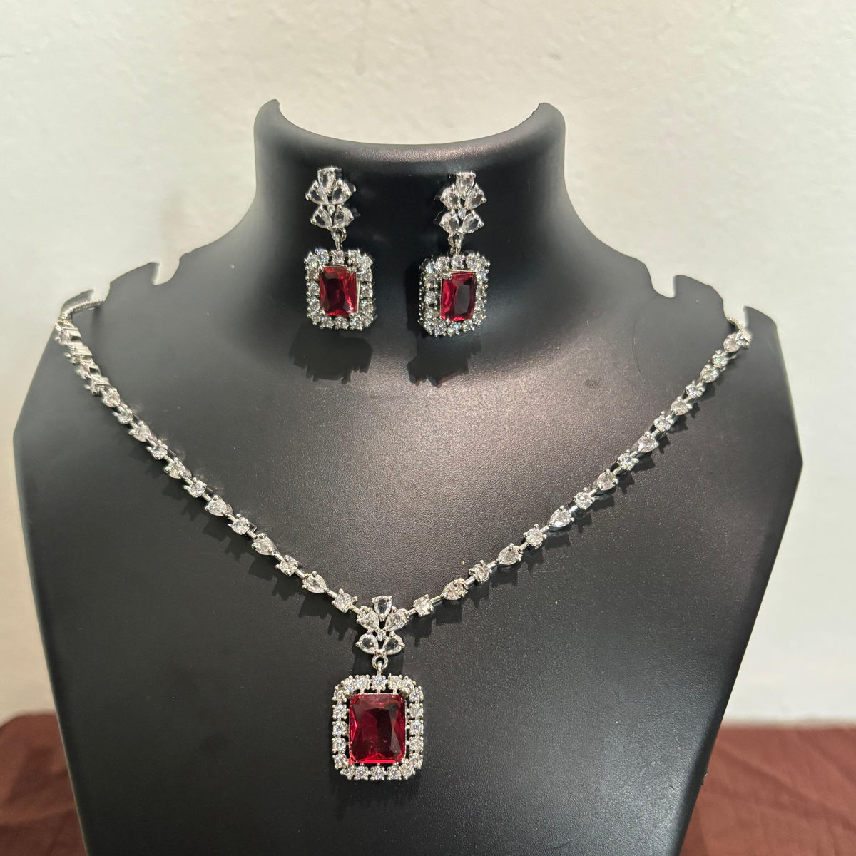 Silver-tone AD ruby-red rectangular pendant necklace set with matching earrings