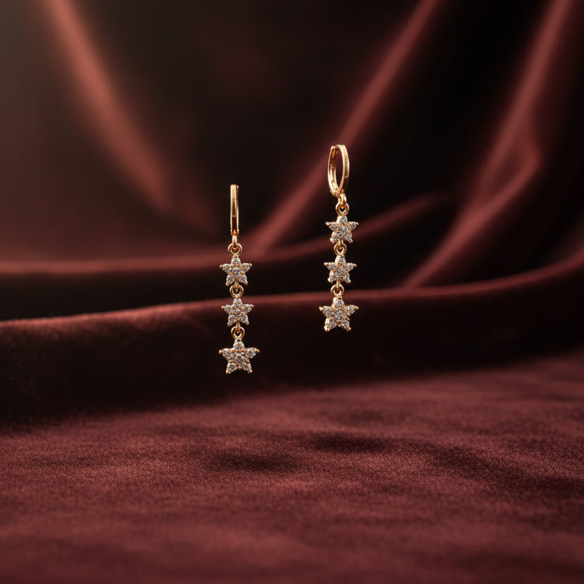 Gold-tone AD CZ floral chain drop earrings with delicate sparkling flower motifs