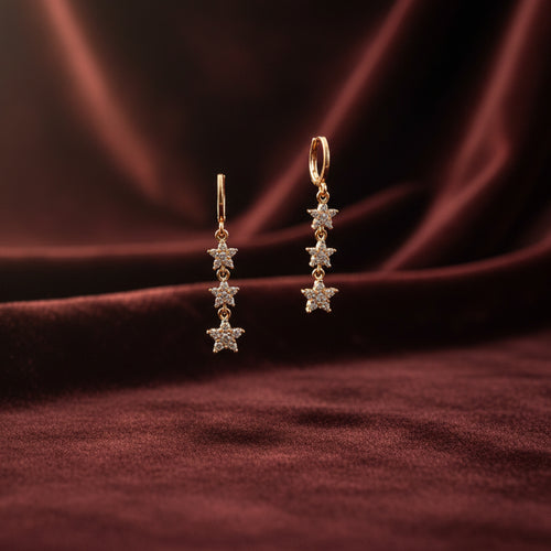 Gold-tone AD CZ floral chain drop earrings with delicate sparkling flower motifs