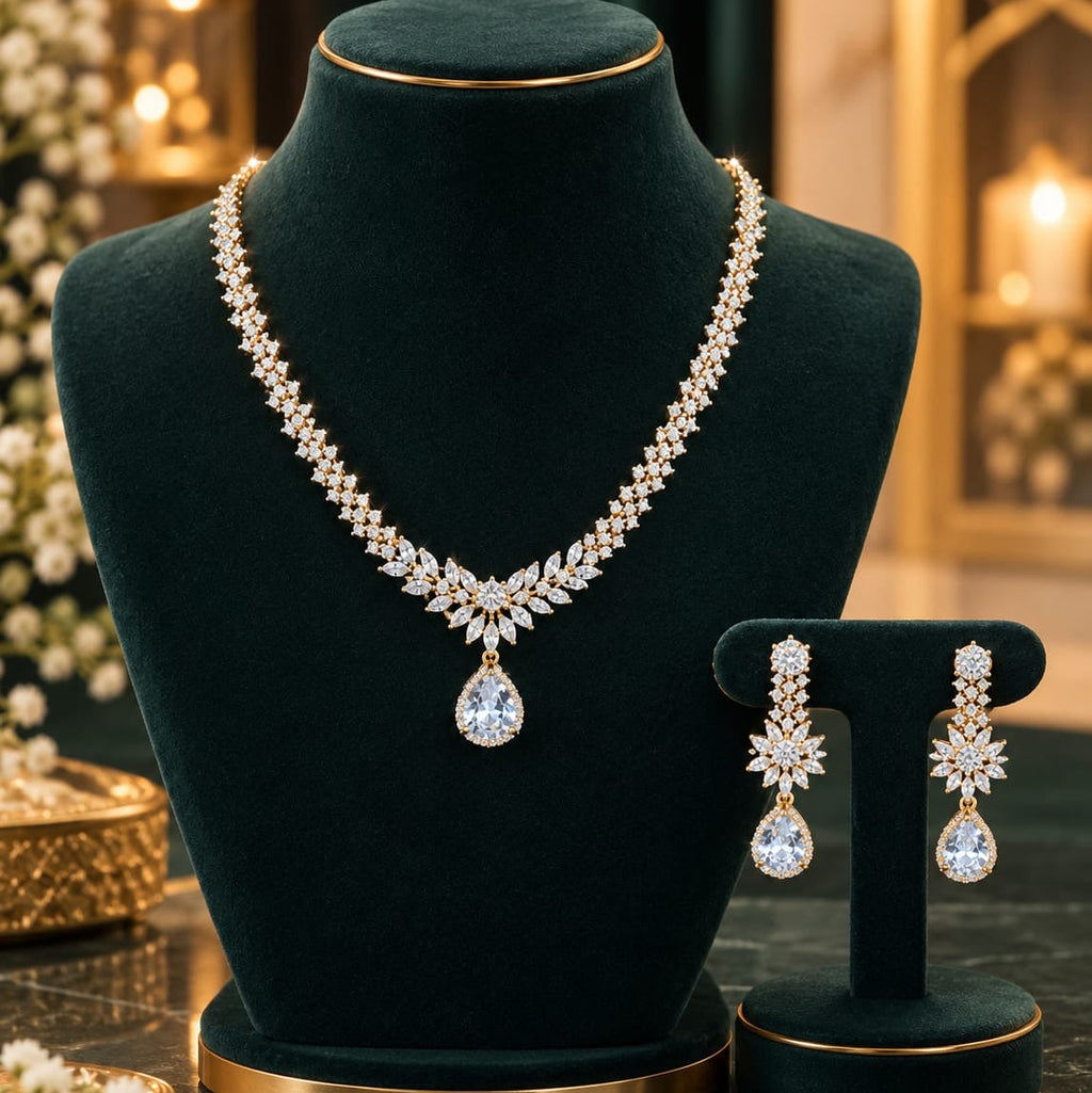 Premium AD CZ necklace set with matching drop earrings on a black jewellery display