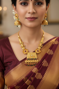 Woman wearing Antique Gold Square Pendant Necklace Set with Jhumka Earrings